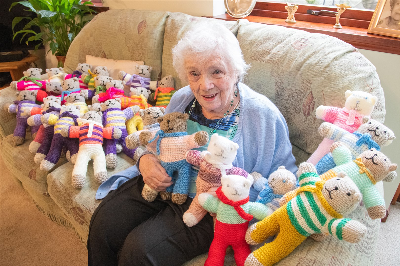 87-year-old Joyce Wilson has knitted over 400 bears for charity - despite having arthritis in her hands. Picture: Daniel Forsyth