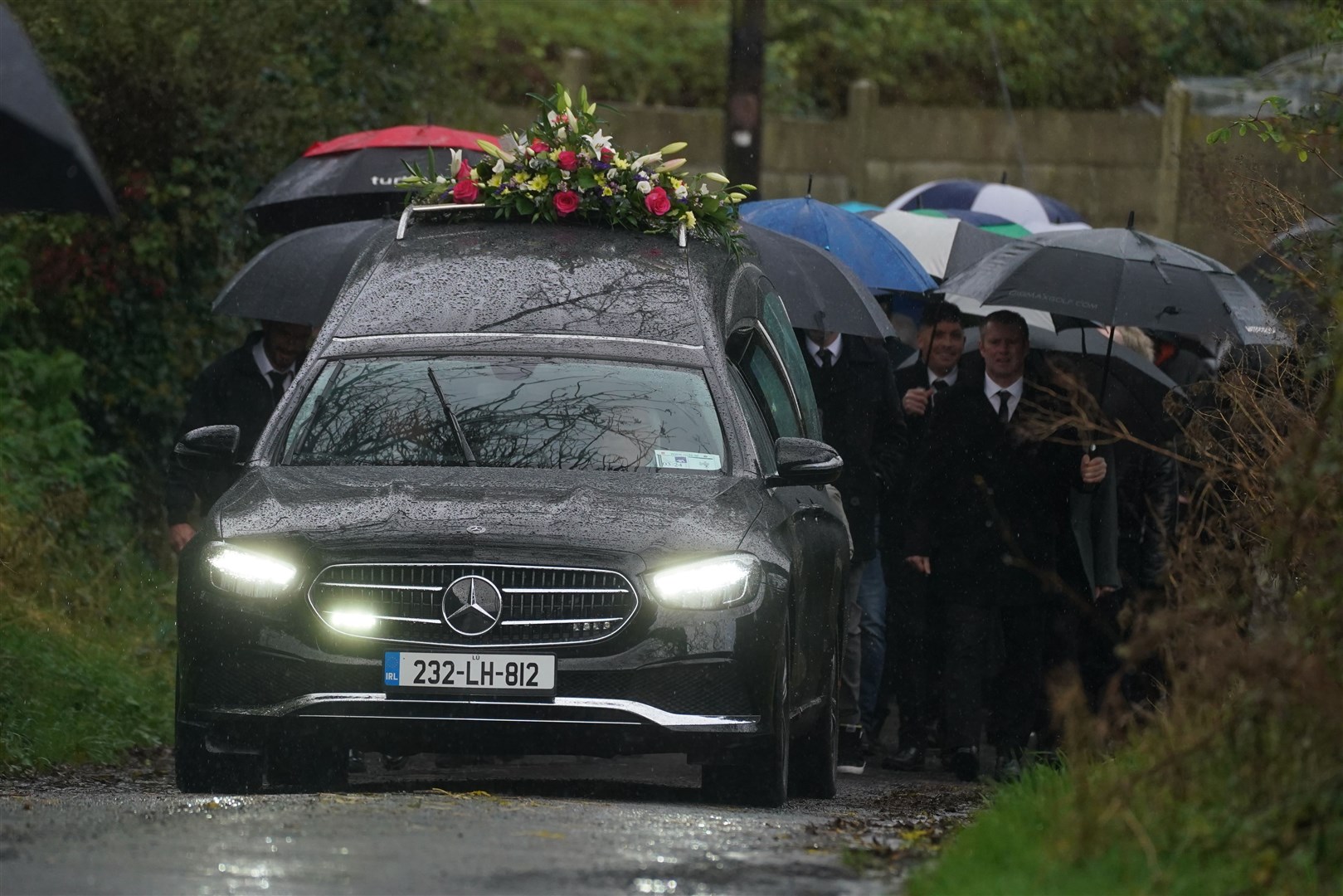 The procession for Denise Morgan arrives at her funeral (Brian Lawless/PA)