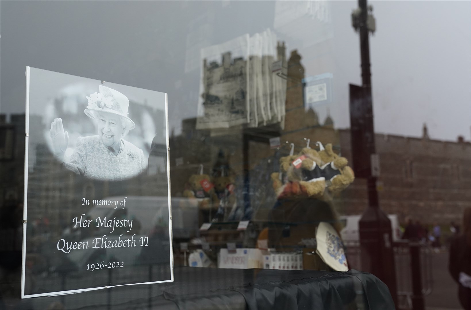 A photograph in memory of the Queen seen in the window of a shop in Windsor, Berkshire (Andrew Matthews/PA)