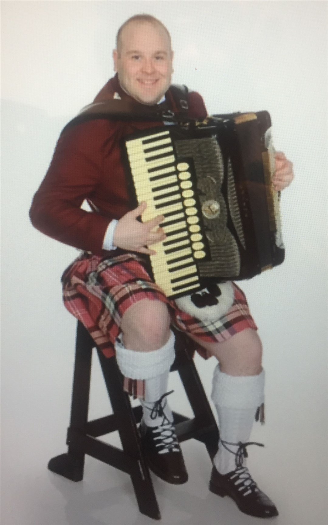 Accordionist Leonard Brown is preparing to perform at Elgin Strapthspey and Reel Society's 46th annual Fiddlers' Rally.