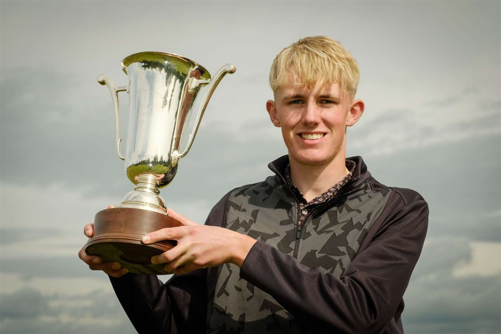 Scottish Boys' Amateur Champion Billy Devine holds the winners trophy at Lanark Golf Club. Picture: Scottish Golf