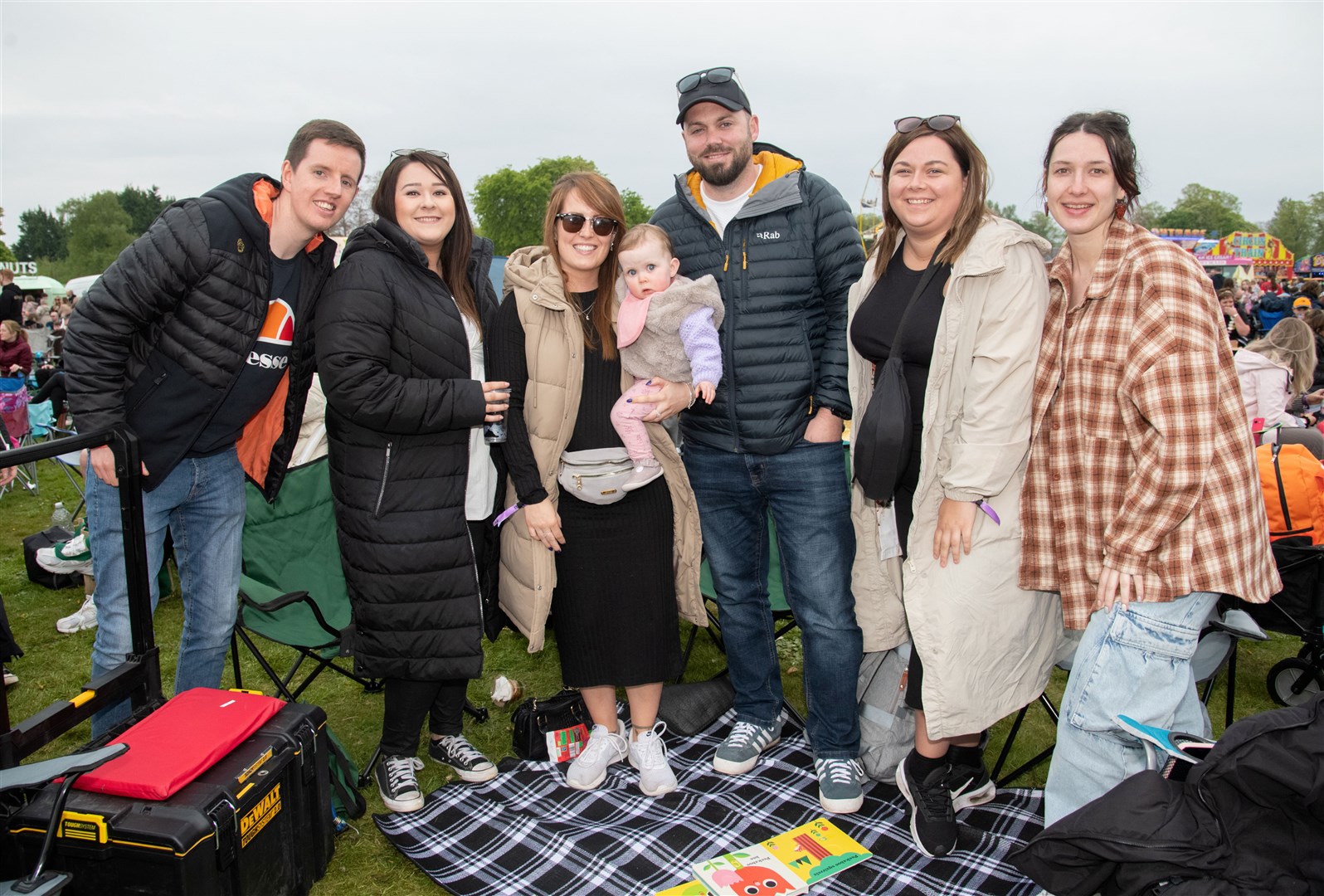 Ellie Hay (centre left) with friends and family. MacMoray Music Festival 2024, held at Cooper Park, Elgin. Picture: Daniel Forsyth.