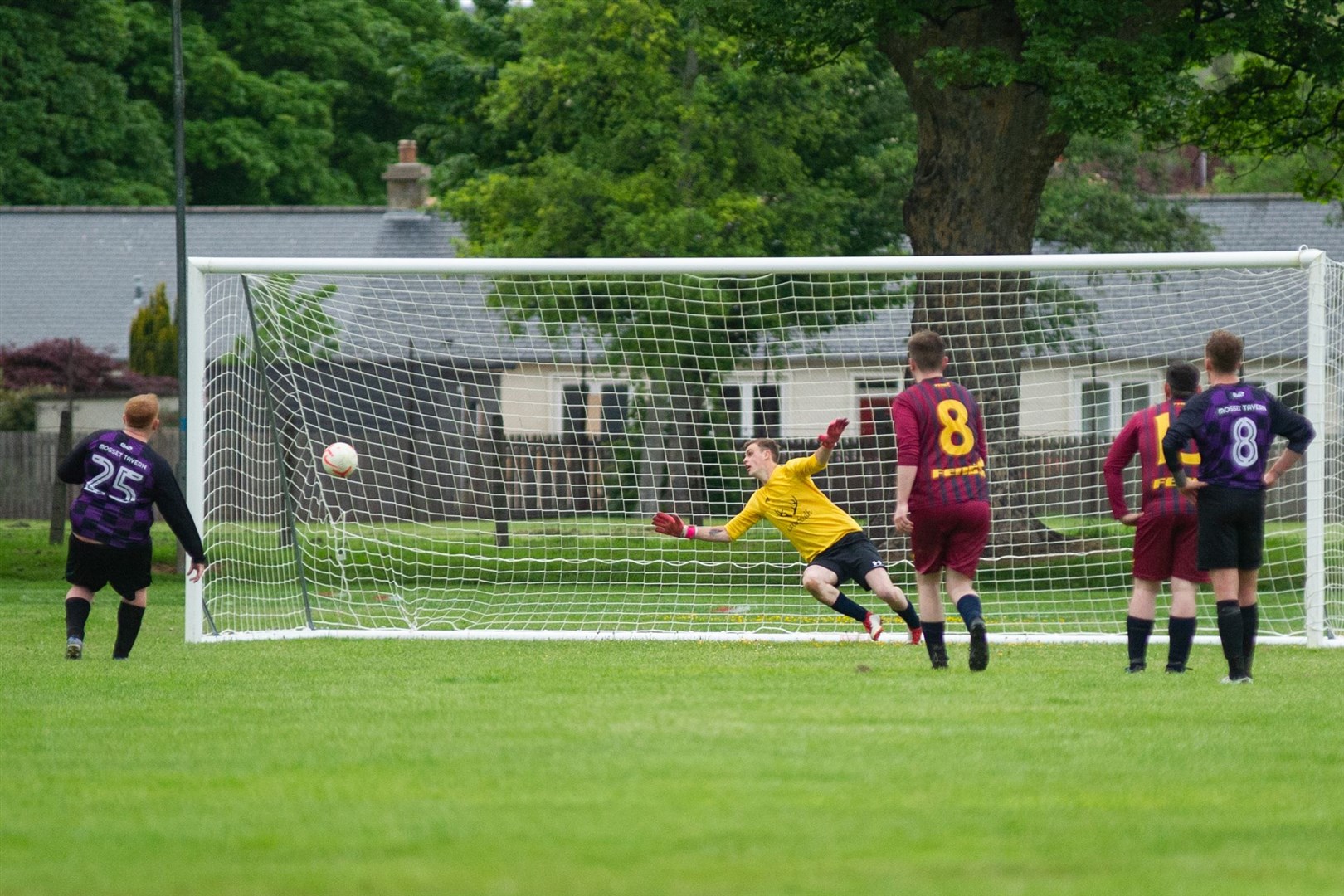 Fraser Thom fires home a Mosset penalty past Caberfeidh keeper Robbie Chalmers...Mosset Tavern FC (5) vs Caberfeidh FC (4) - Forres & Nairn Welfare League...Picture: Daniel Forsyth..