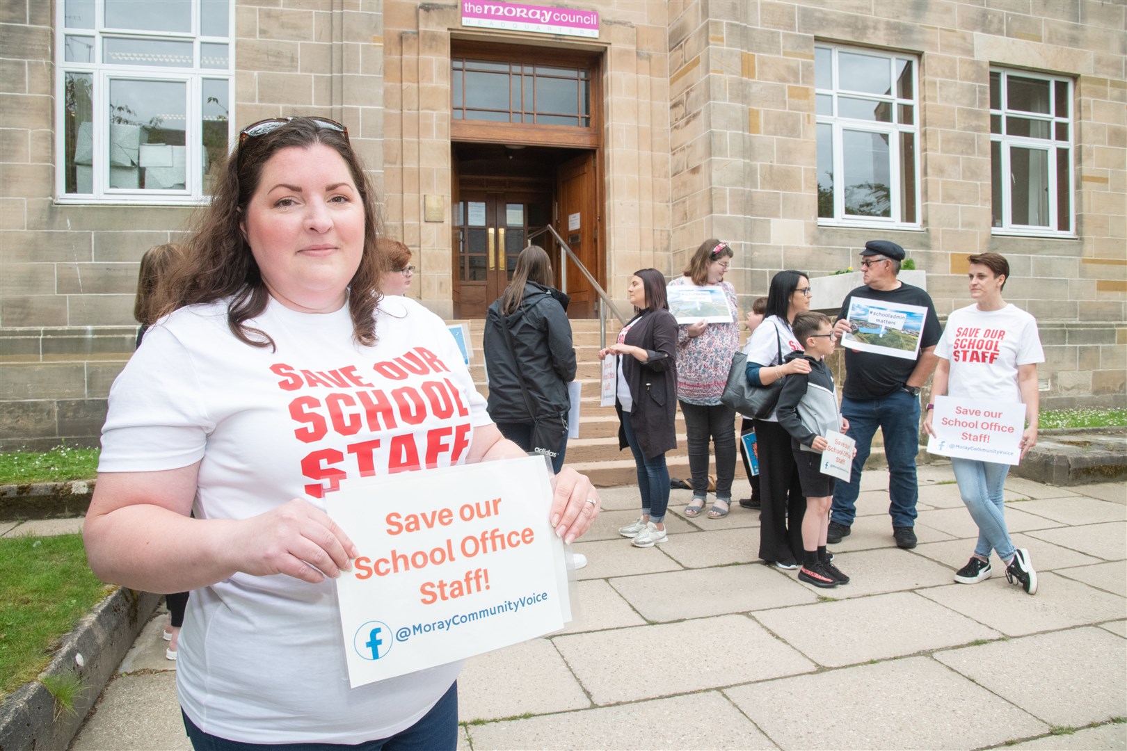 Sophie McWhirter...Demonstrators gather outside Moray Council's Headquarters ahead of a full council meeting to protest the proposed cuts to school staff. ..Picture: Daniel Forsyth..