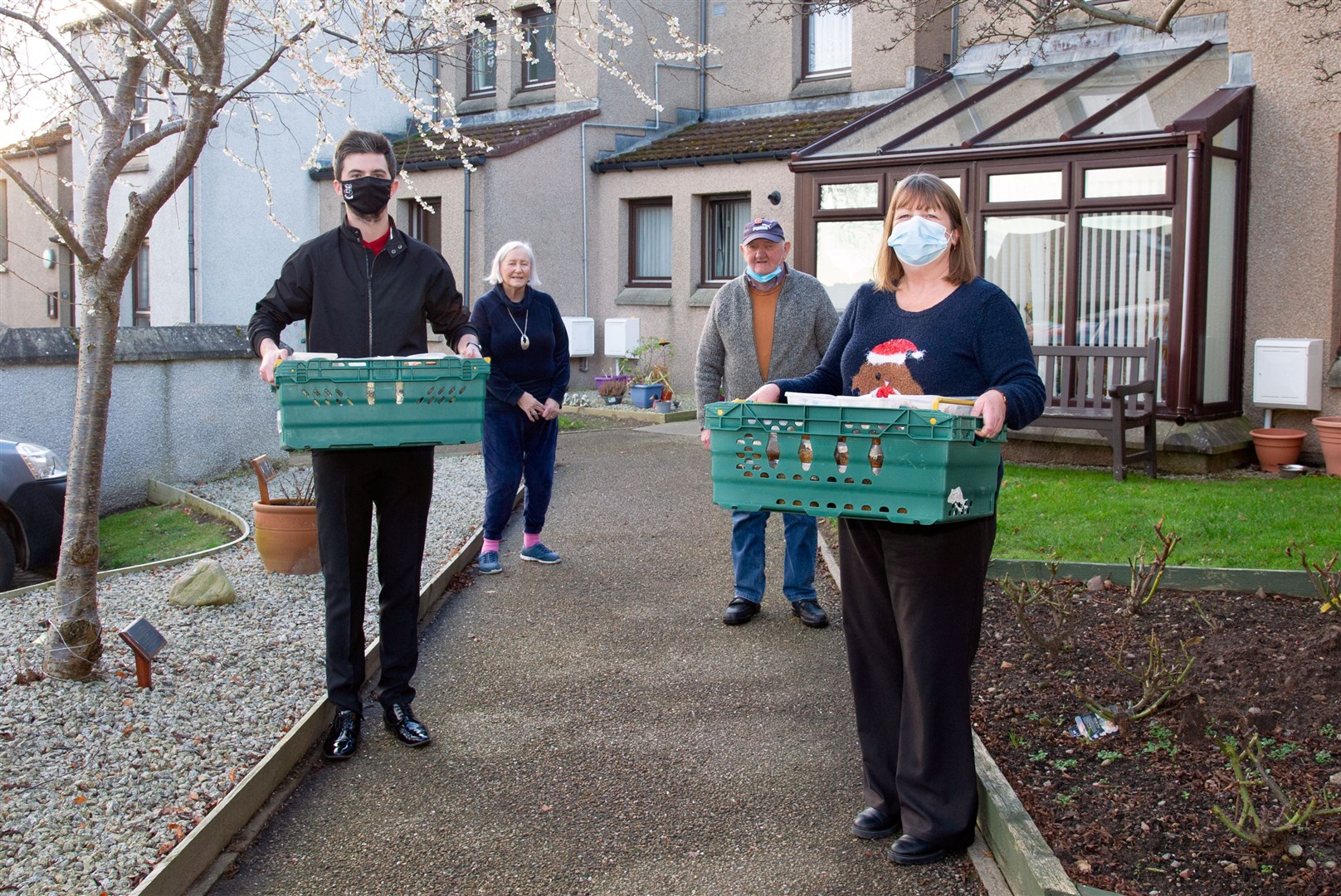 Delivering Christmas food to elderly residents in Moray. Picture: Daniel Forsyth..