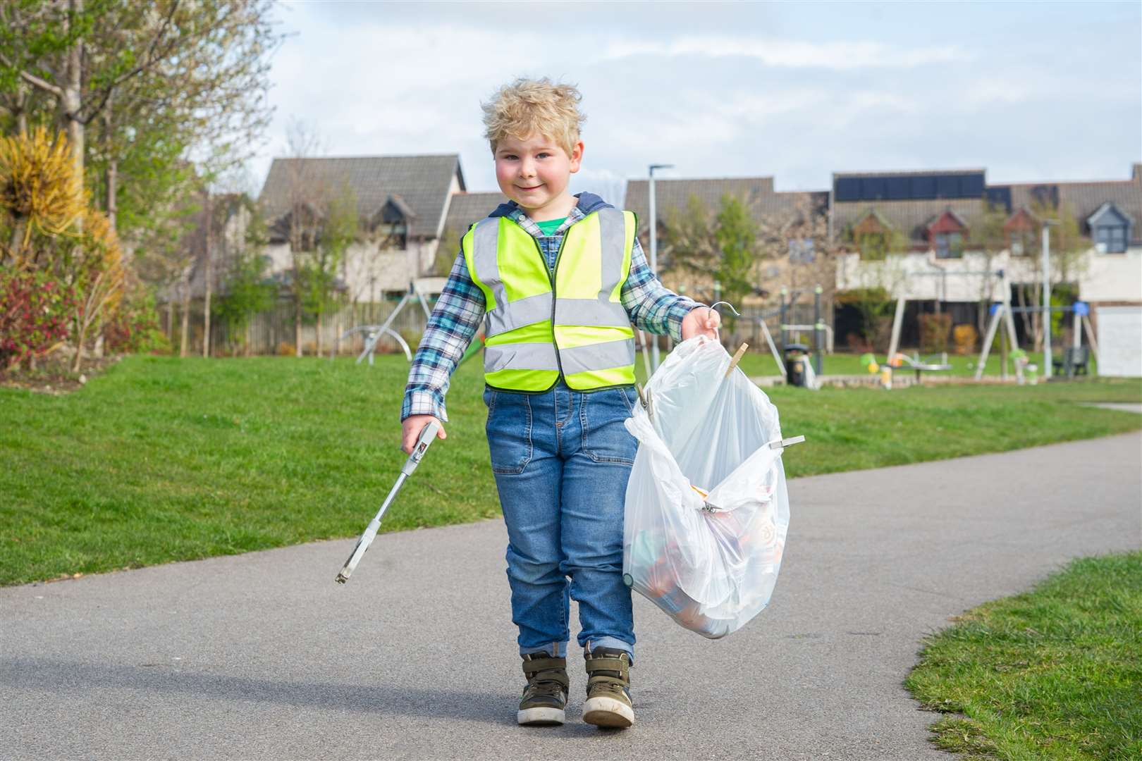 5-year-old Zayne Logan has been busy picking up litter from around his home. He has already picked up over 50 bags full...Picture: Daniel Forsyth..