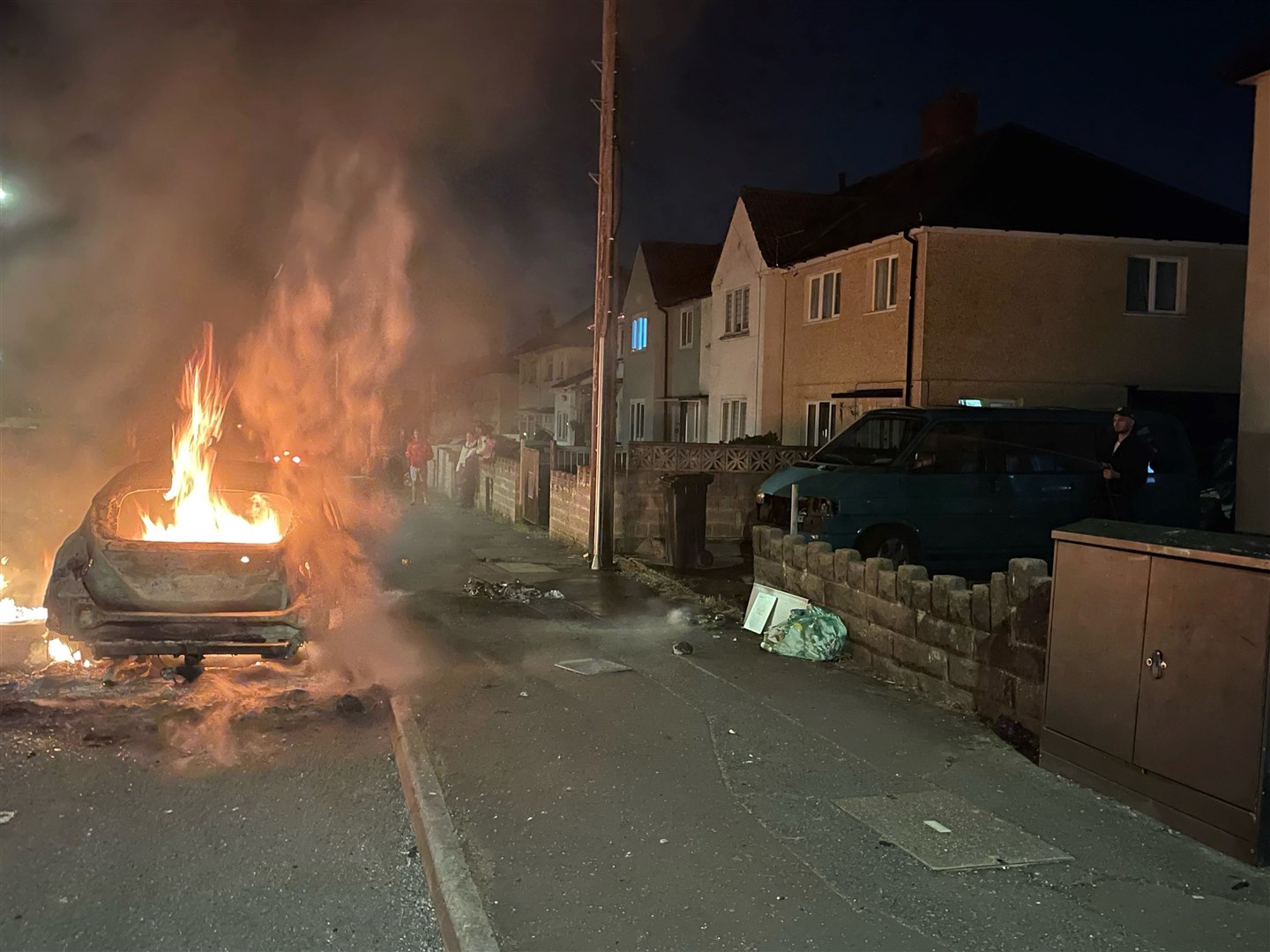 Tensions between locals and police at the scene led to a riot lasting several hours (Bronwen Weatherby/PA)