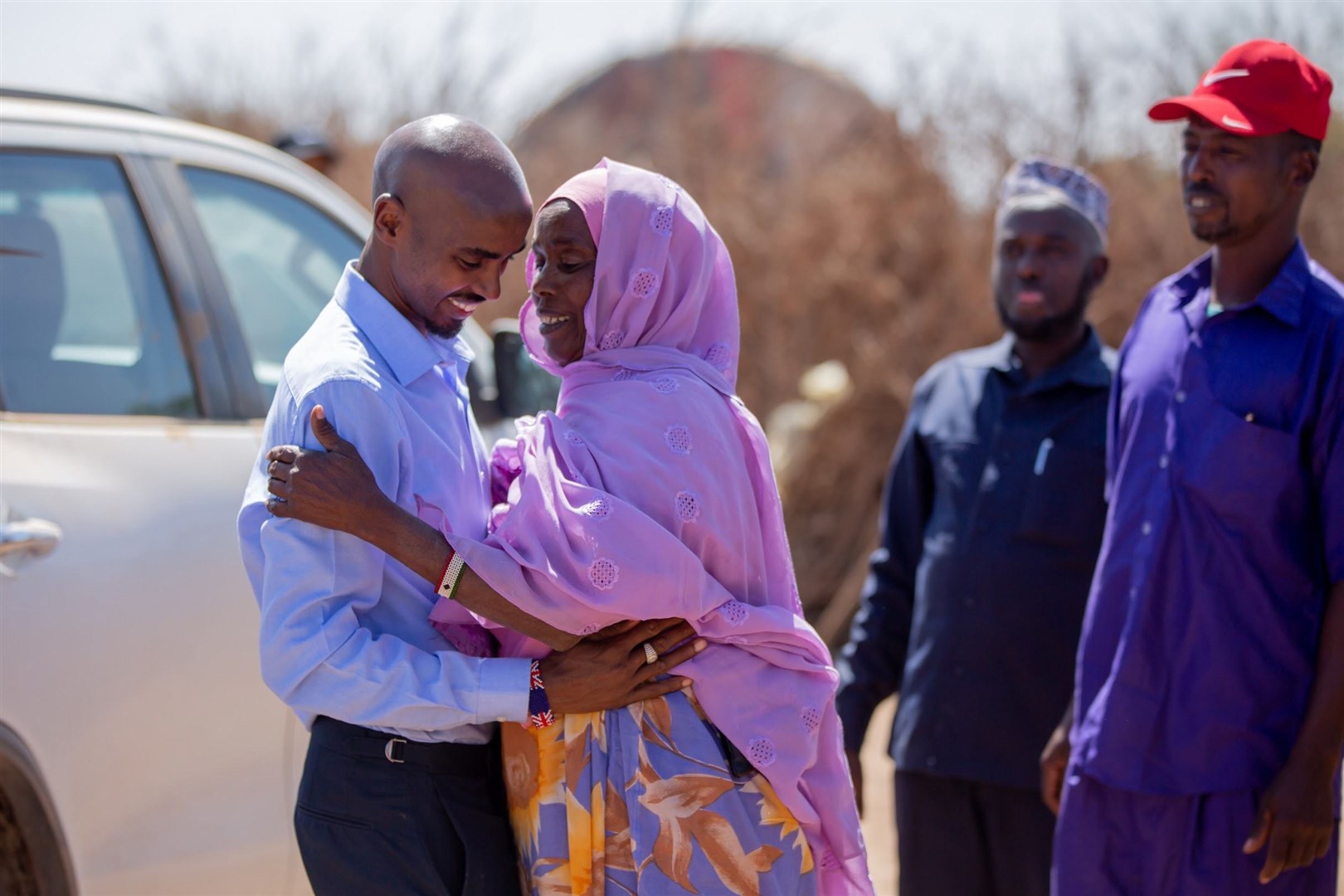 Sir Mo Farah with his mother Aisha during the filming in Somaliland of the BBC documentary, The Real Mo Farah (Ahmed Fais/BBC/PA)