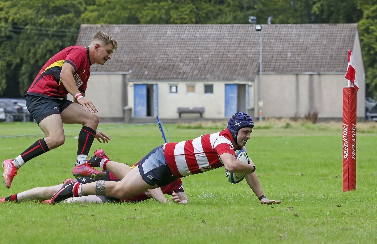 Connor McWilliam goes over the line for his Moray try. Photo: John MacGregor
