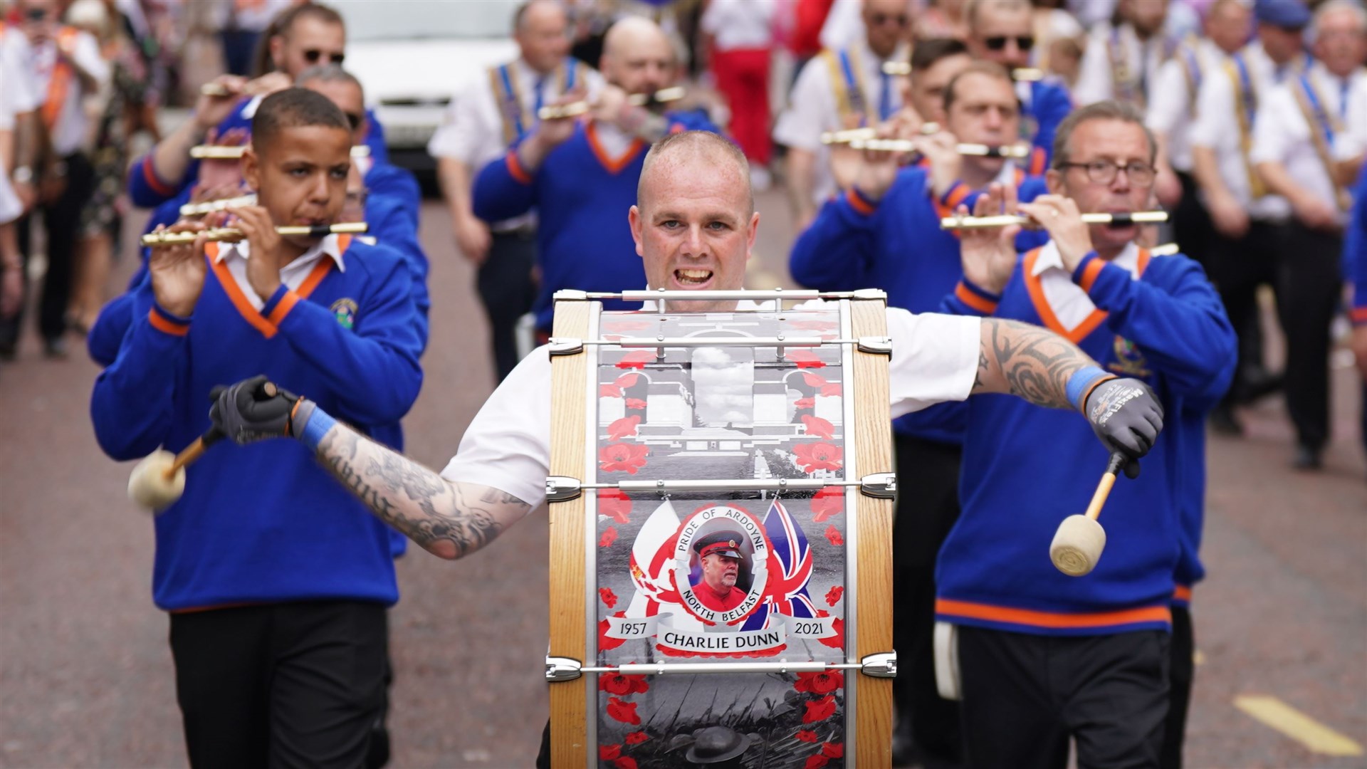 Members of a Protestant loyalist order take part in a Twelfth of July parade in Belfast (Niall Carson/PA)