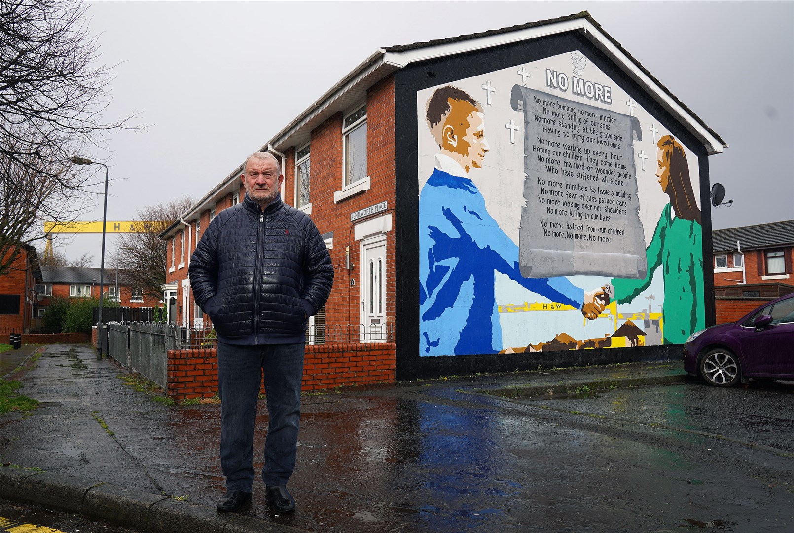 Former loyalist internee Jim Wilson at the ‘No More’ mural close to his home in east Belfast (Brian Lawless/PA)