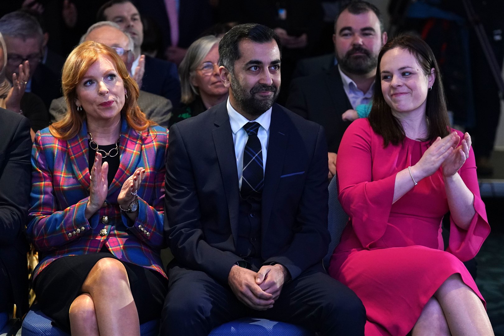 Ash Regan, Humza Yousaf and Kate Forbes look on as Mr Yousaf was announced SNP leader (Andrew Milligan/PA)