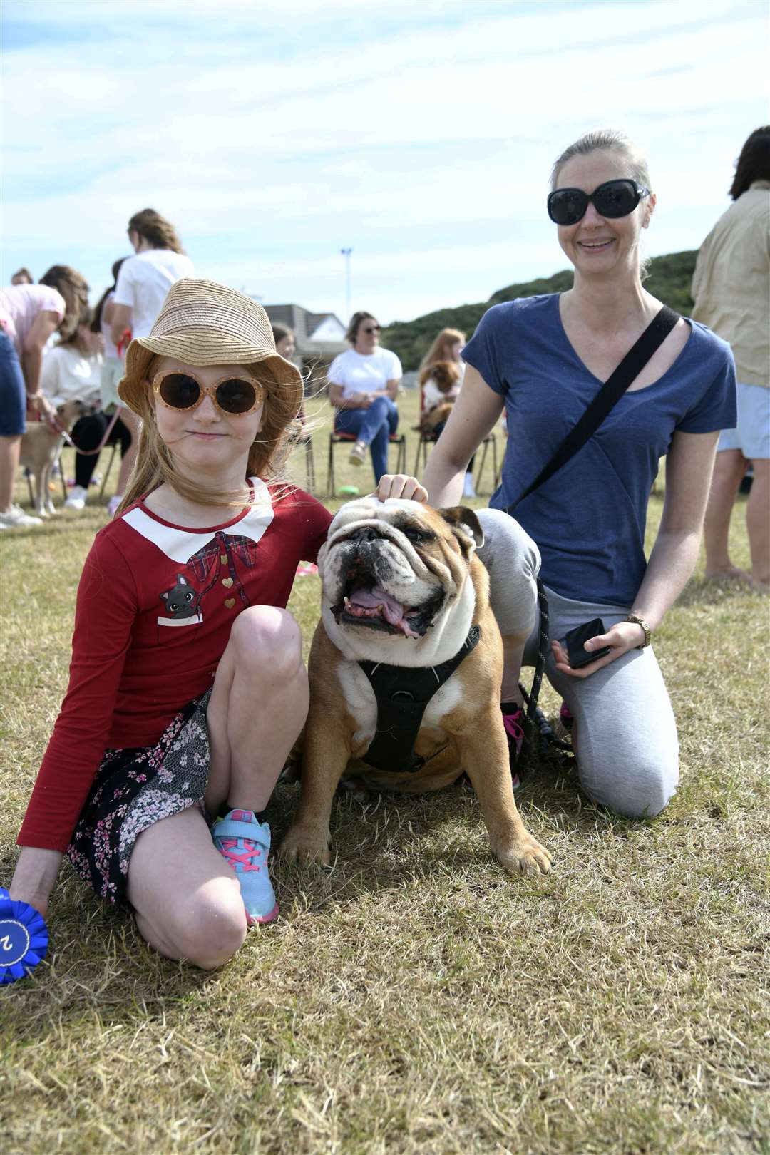 Sarah Russell (right) and Jodie Brennan (left) with their bulldog, Kane, who came 2nd in the medium dog category. Picture: Beth Taylor