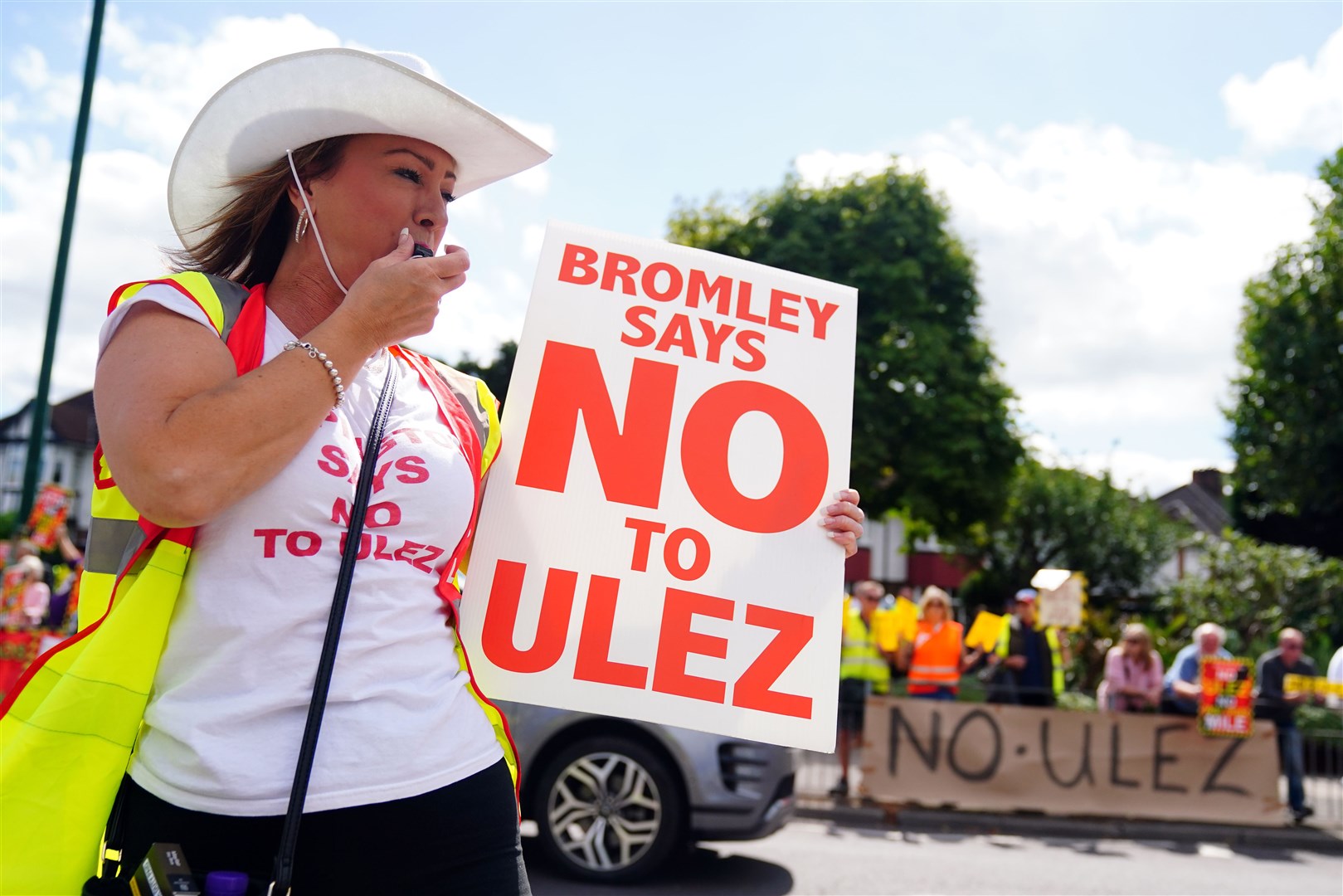 A protester in south London fighting against the Ulez expansion (PA/Victoria Jones)