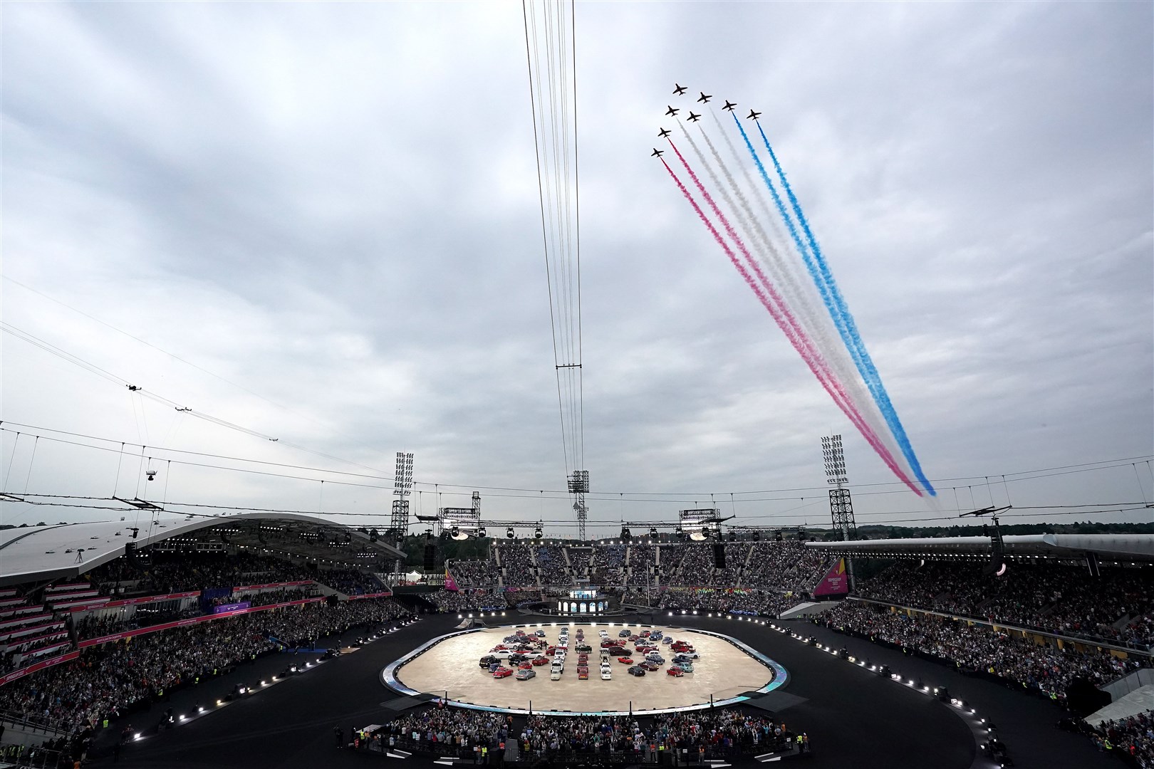 The Red Arrows flypast goes over the stadium during the opening ceremony (Zac Goodwin/PA)