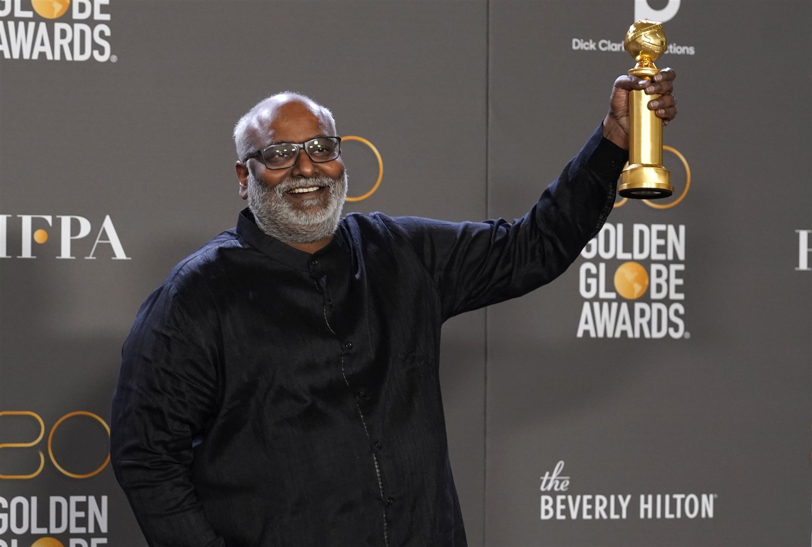 MM Keeravani poses in the press room with the award for best original song, motion picture for Naatu Naatu from RRR (Photo by Chris Pizzello/Invision/AP)