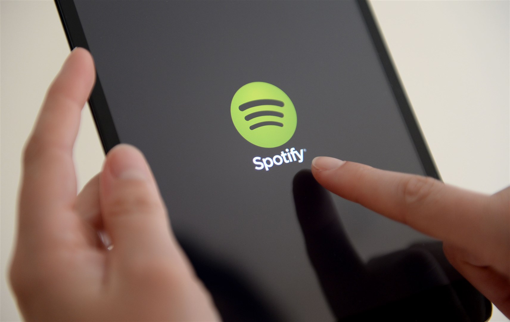 Subscription streaming services such as Spotify and Apple Music continued to help boost the music market by 9.0% in 2022 (Andrew Matthews/PA)