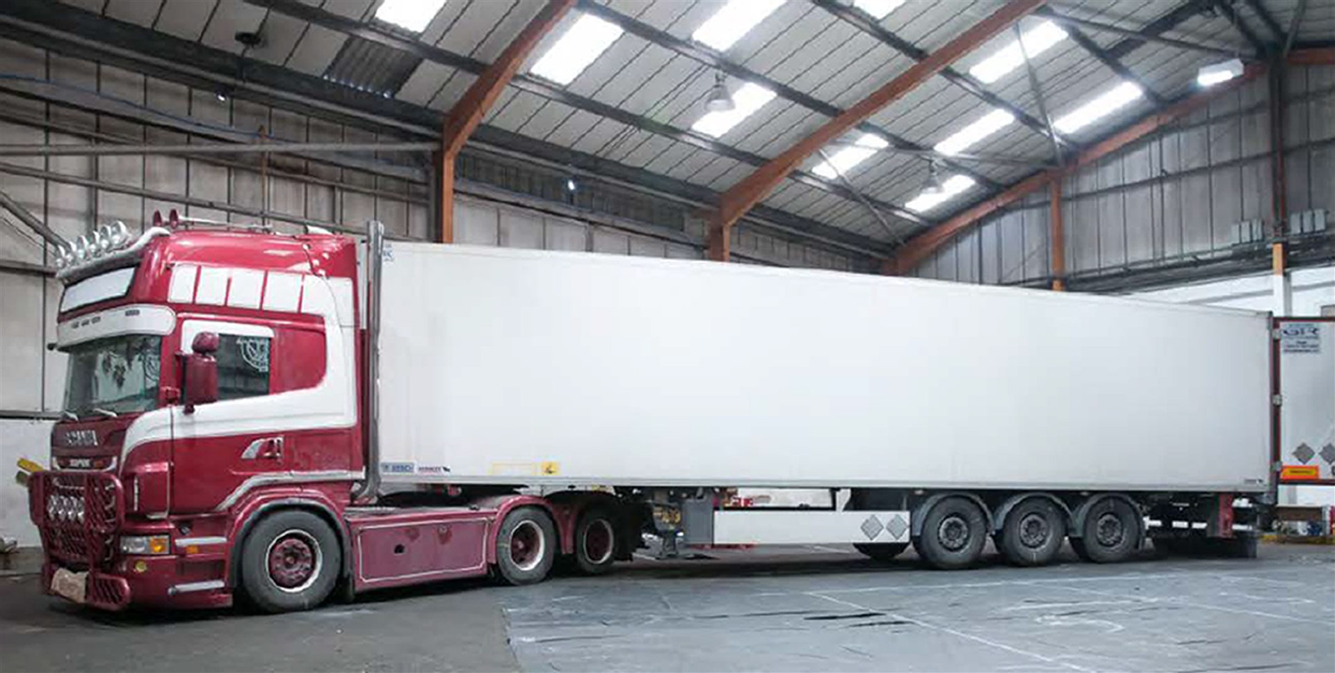 The trailer and tractor unit where the bodies of the migrants were found (Essex Police/PA)