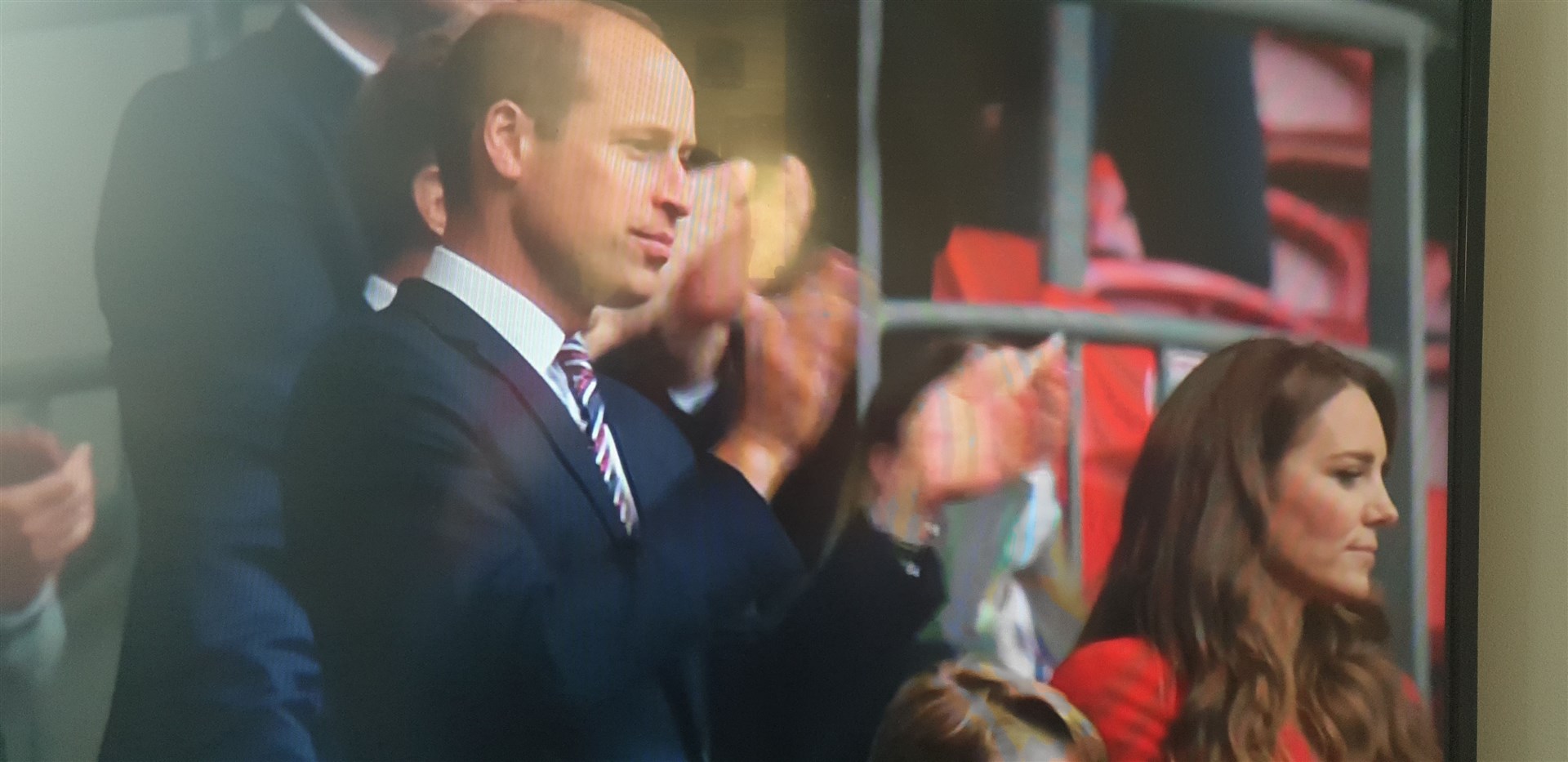 Prince William cheers on England.