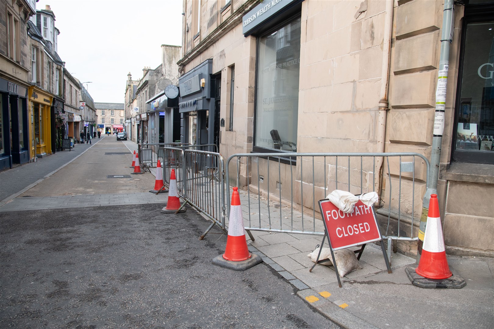 Sirology and Grierson Wealth Management remain open despite the fencing being in place. Picture: Daniel Forsyth