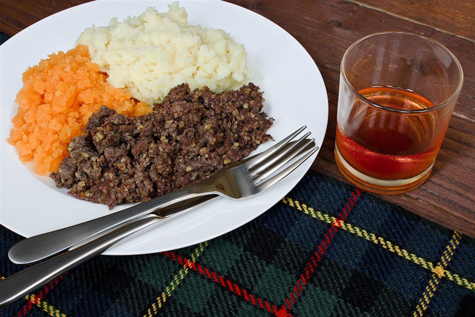 Haggis, neeps and tatties with a dram.