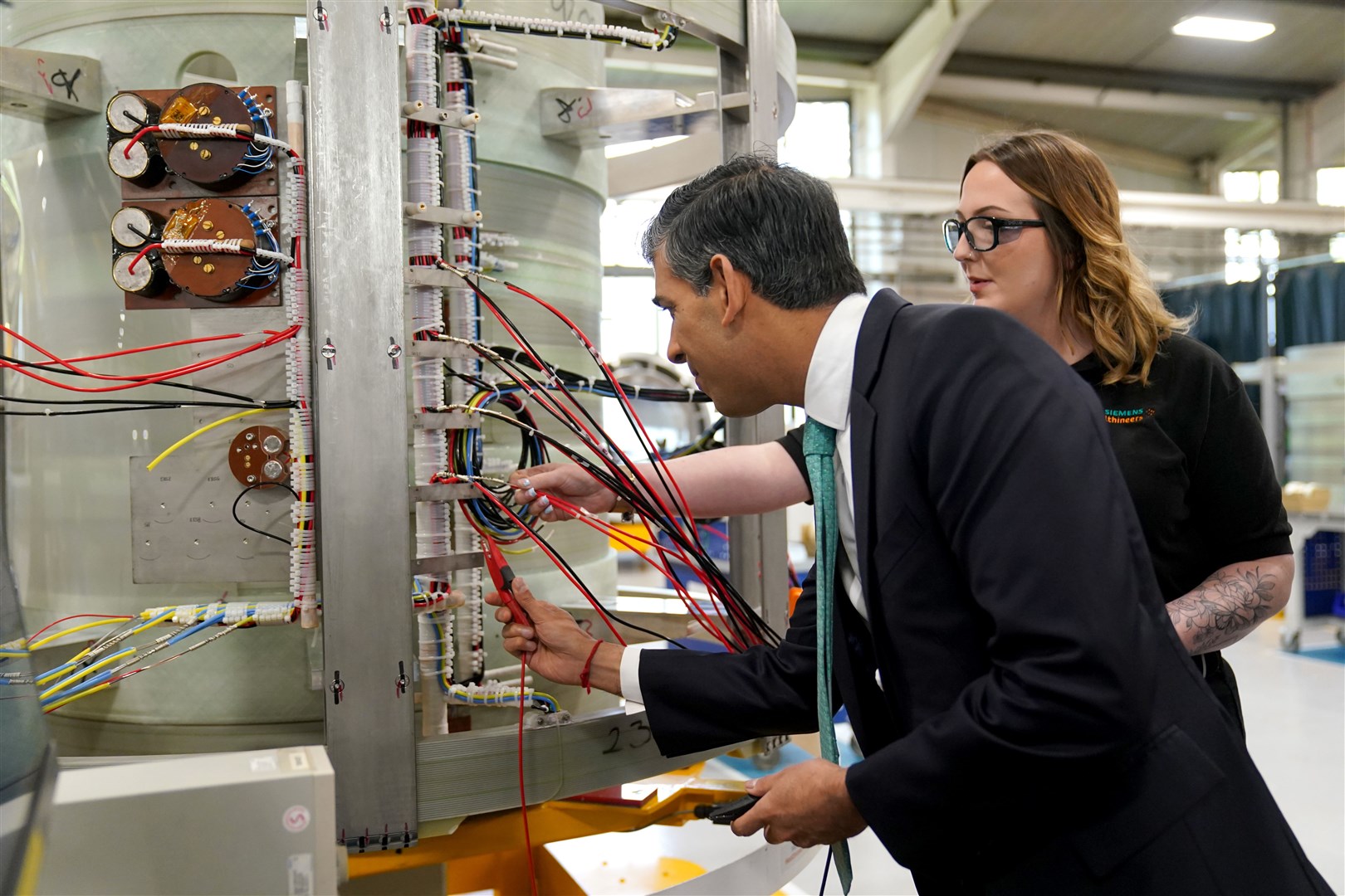 Mr Sunak was shown the magnet technology developed at the factory (Jacob King/PA)