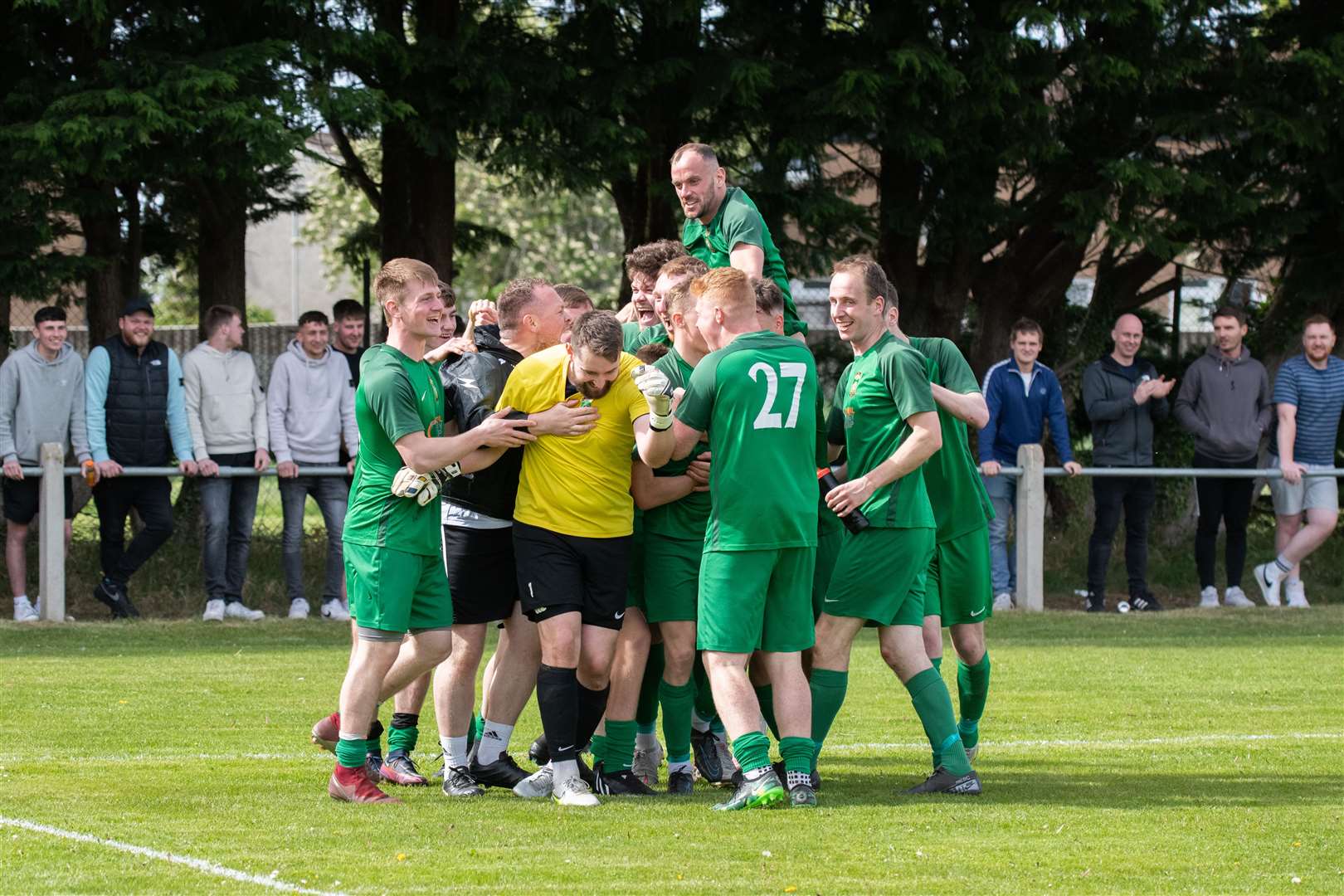 Dufftown celebrate their cup success...Dufftown FC (2) vs Forres Thistle FC (2) - Dufftown FC win 5-3 on penalties - Elginshire Cup Final held at Logie Park, Forres 14/05/2022...Picture: Daniel Forsyth..