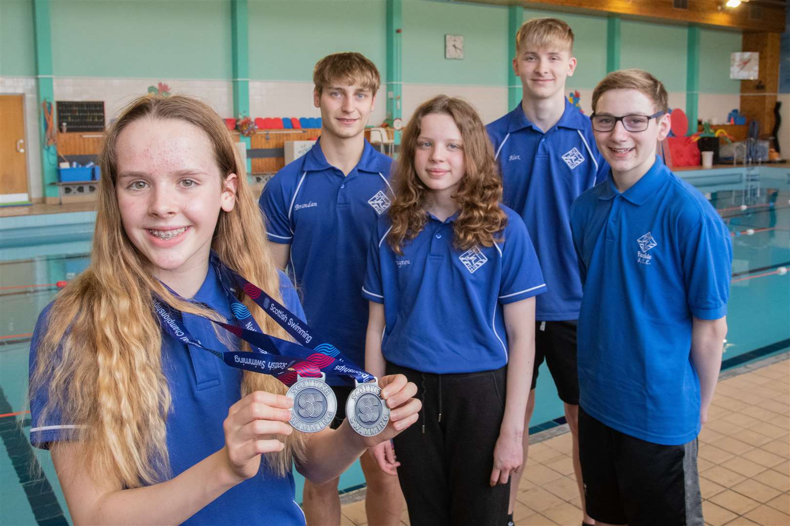 Showing off their spoils from the recent Scottish National Age Group Championships are BASC swimmers (from left) Madison Coull, Brandon Aitchison, Payton Forbes, Alex Thompson and Kallum Aitchison. Picture: Daniel Forsyth