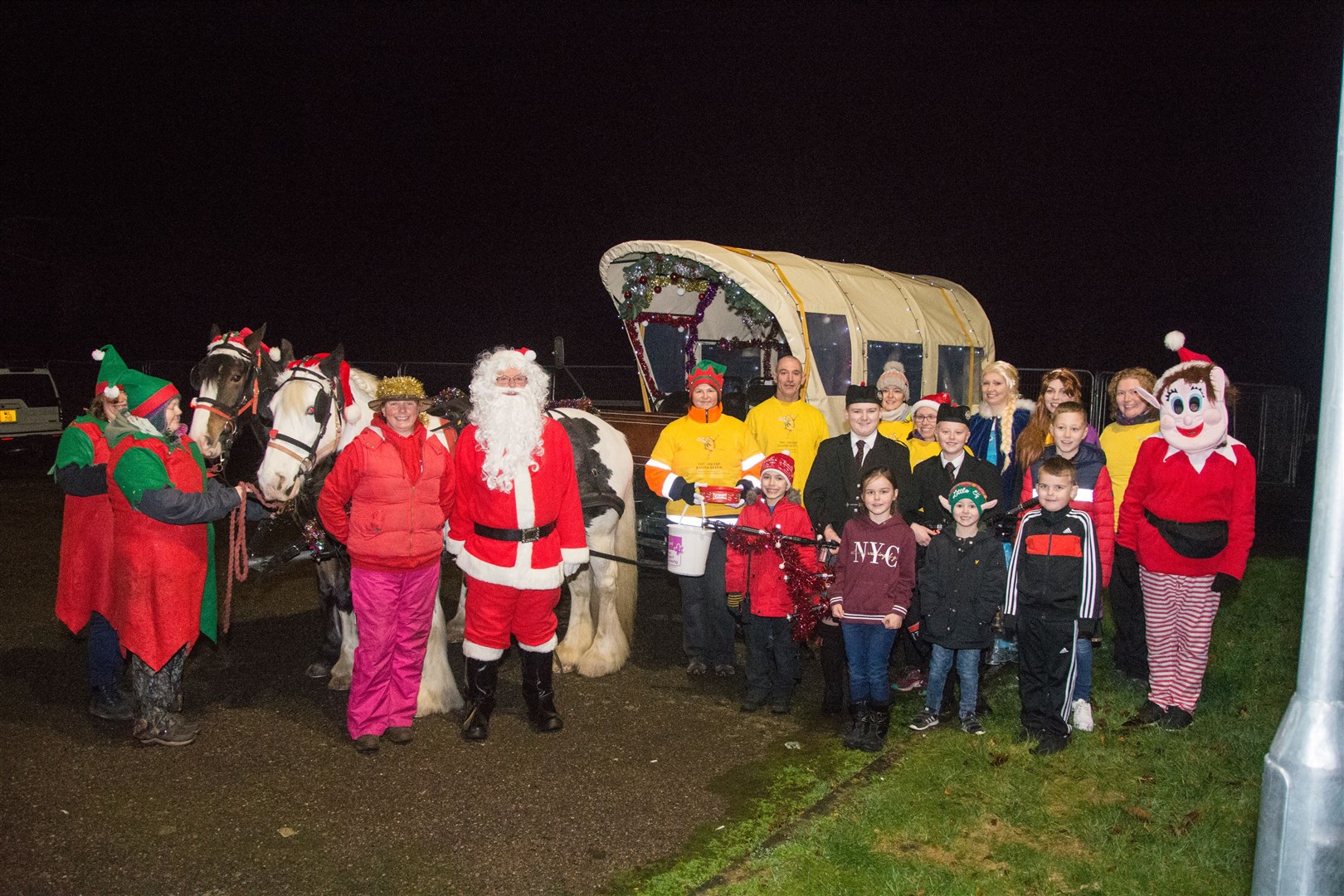 Volunteers and organisers assemble before setting off for Santa on the Streets 2019. Picture: Becky Saunderson.