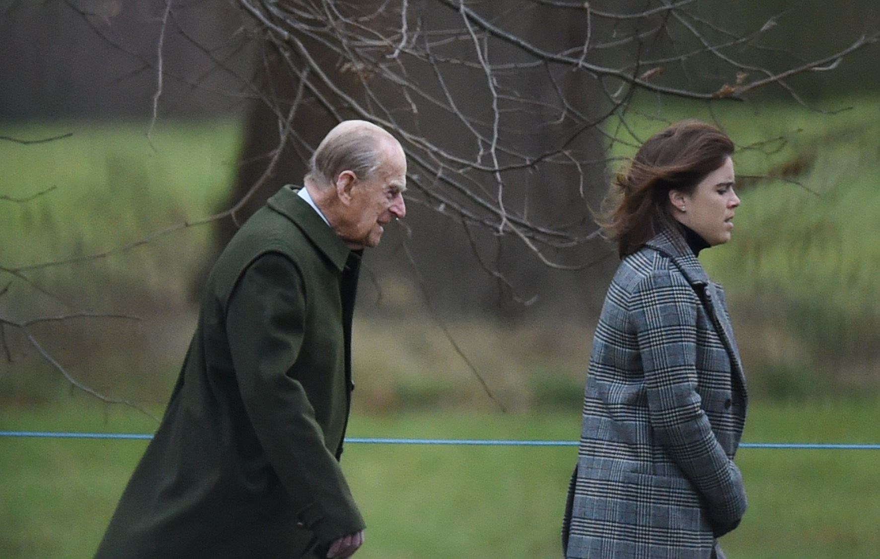 The Duke of Edinburgh with his grand daughter Princess Eugenie (Joe Giddens/PA)