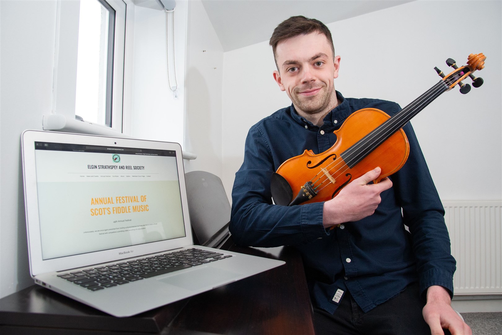 Garmouth fiddler James MacGregor has entered the Championship Class in the Elgin Strathspey and Reel Society virtual Scots Fiddle Festival this year. Picture: Daniel Forsyth.