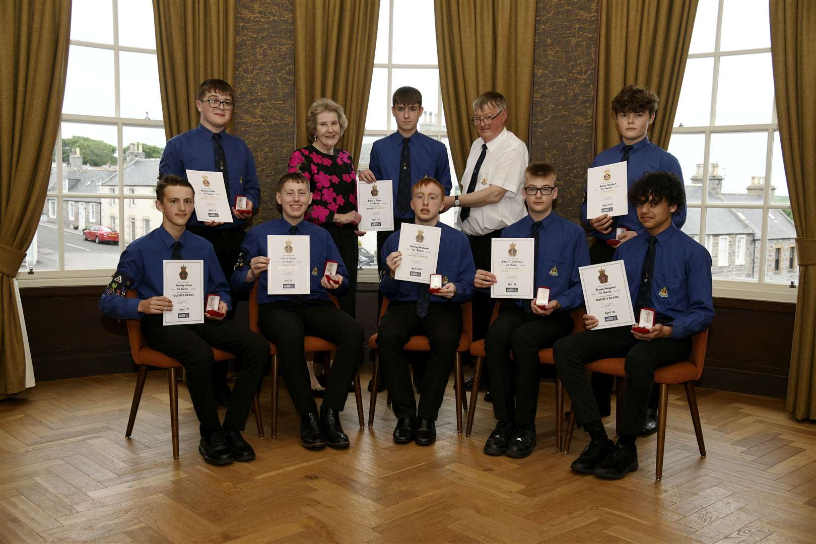 The Queen's men with their badges and certificates, joined by Clare Russell and Captain Alan McIntosh. Picture: Eric Cormack