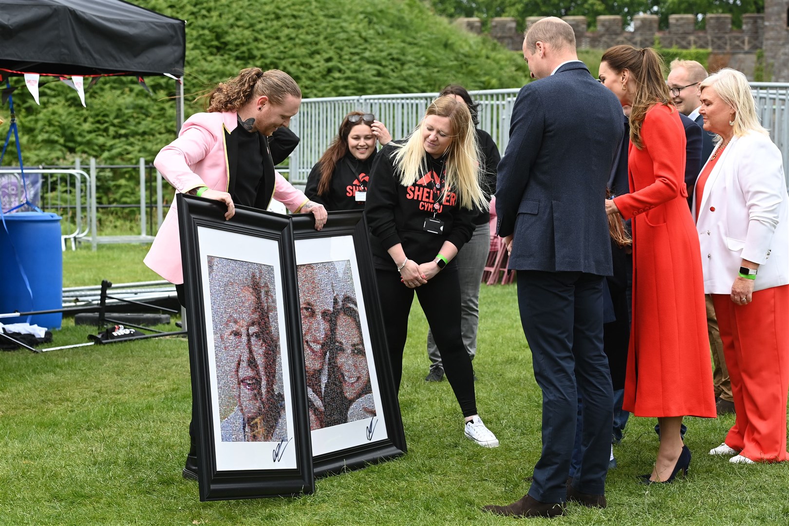 The Duke and Duchess of Cambridge are shown two collages by artist Nathan Wyburn (Ashley Crowden/PA)