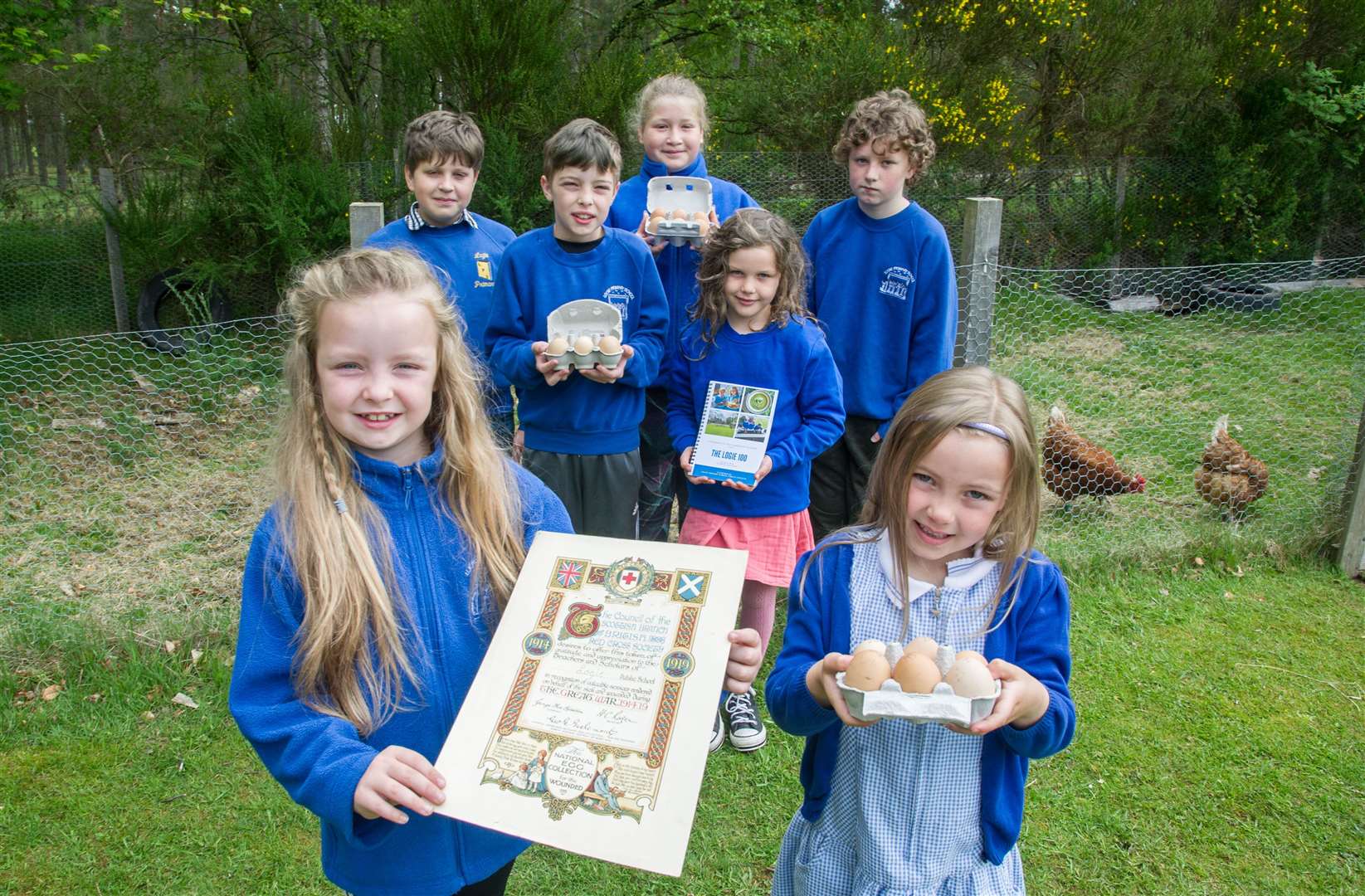 The pupils with the certificate from 100 years ago and some eggs from the hens which they still keep today. Back from left Ross Hunter, Tristan Shevill, Alice Rochester, Ellie Edgar and Craig Murray with Ami-Leigh Shevill (front left) and Chloe Nicolson (front right). Picture: Becky Saunderson