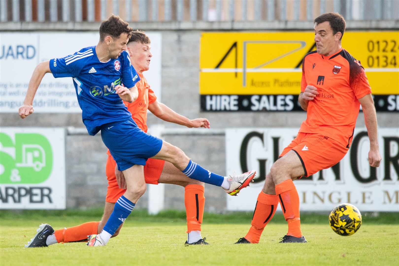 Lossie forward Ryan Farquhar takes a second half shot on goal. ..Rothes FC (1) vs Lossiemouth FC (0) - Highland Football League 23/24 - Mackessack Park, Rothes 16/09/2023...Picture: Daniel Forsyth..
