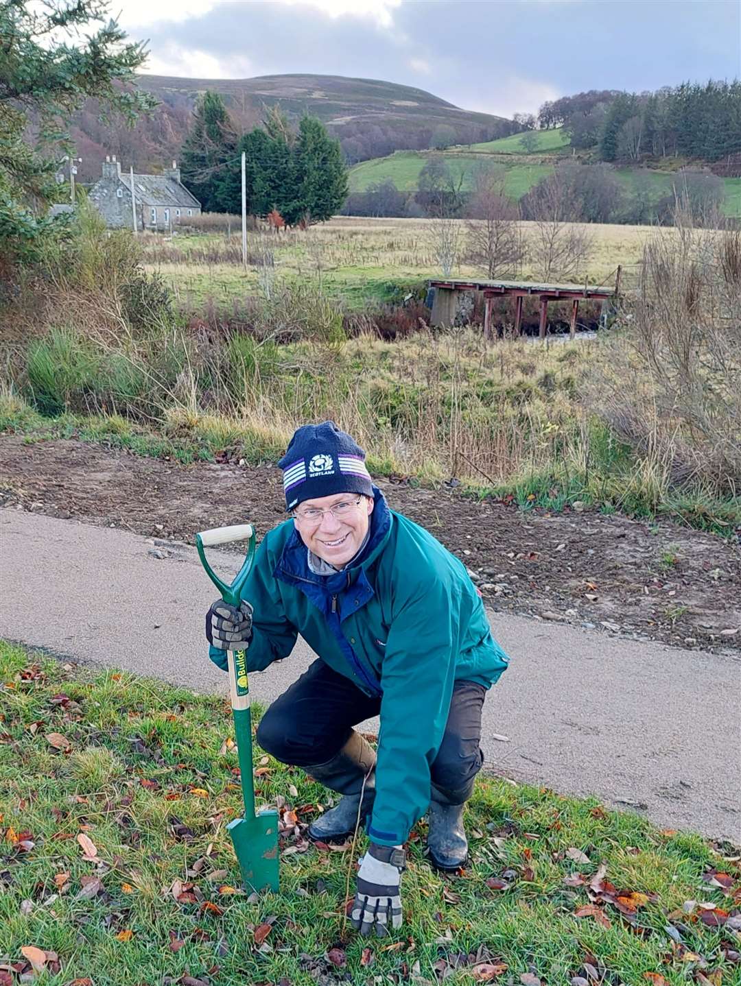 Lord Lieutenant of Banffshire Andy Simpson planting a tree in the Cabrach.