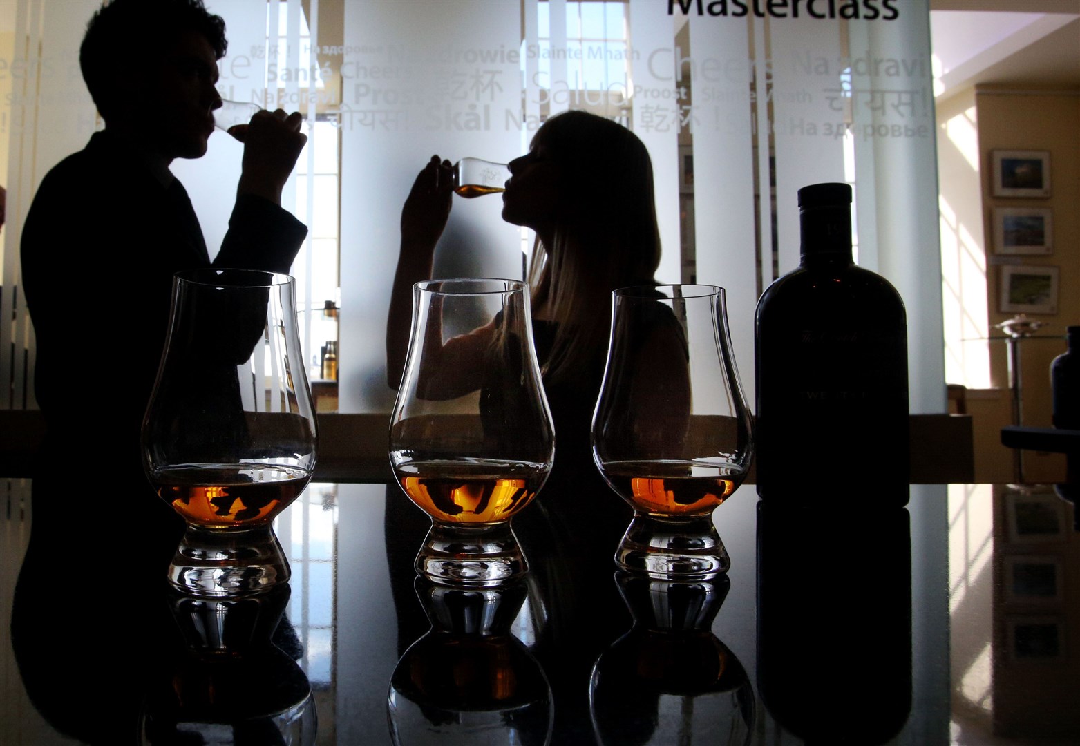 Whisky being consumed (David Cheskin/PA)