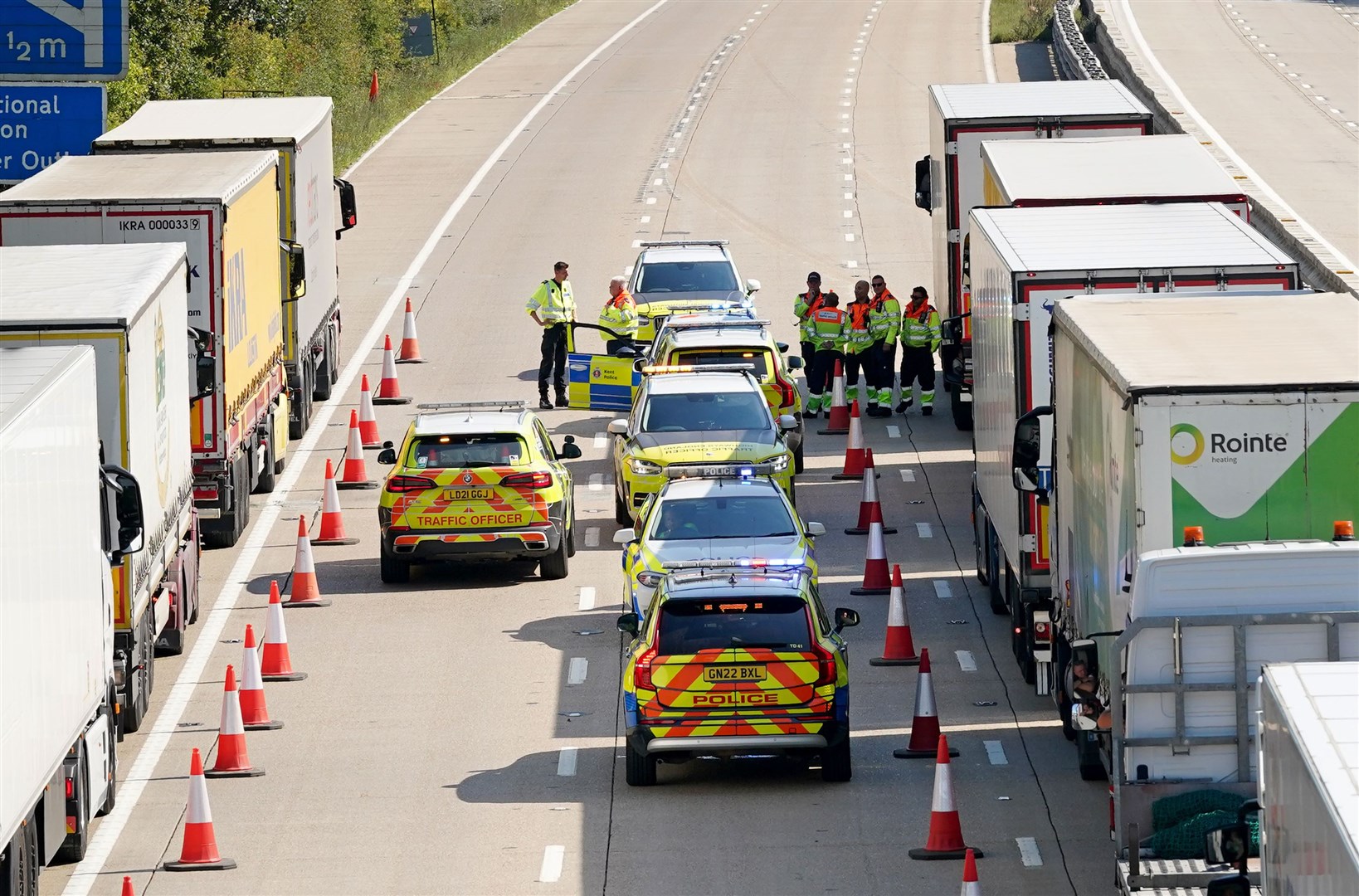 Lorries queue for the Port of Dover along the M20 near Ashford in Kent as security checks are being carried out at the port