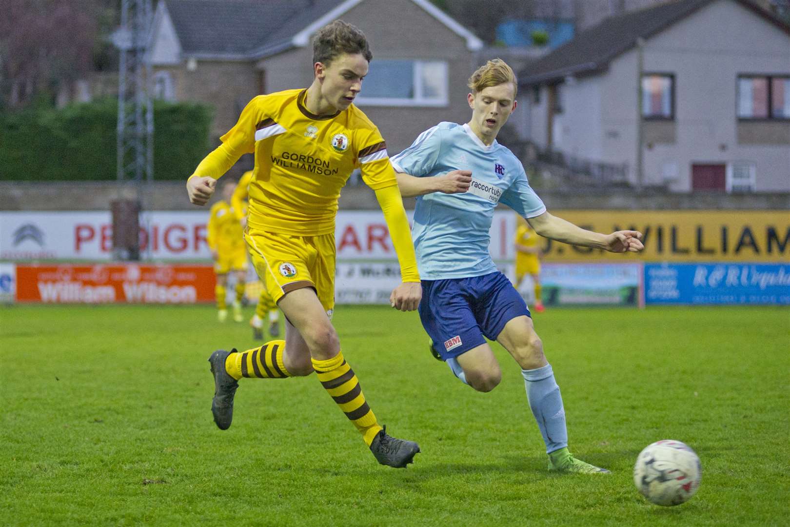 Ruari Fraser (left) in action for Forres Mechanics during a loan spell from Ross County. Picture: Daniel Forsyth.