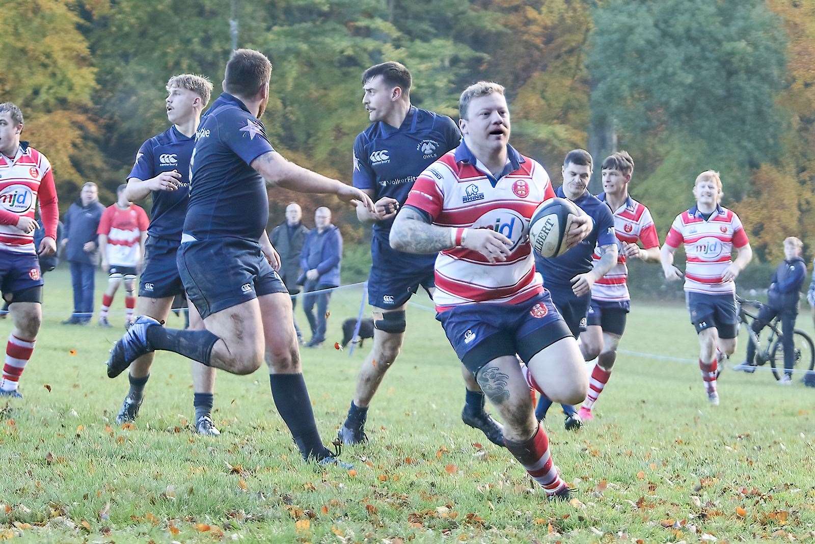 Lewis Scott runs in a try. Picture: John MacGregor
