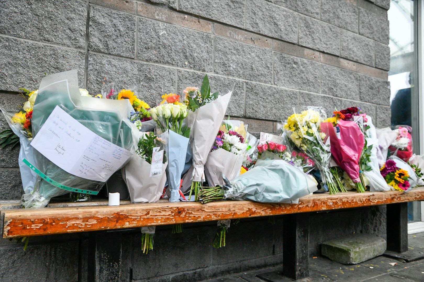 Tributes have been left on a bench in memory of Elgin bus driver Keith Rollinson. Picture: Beth Taylor