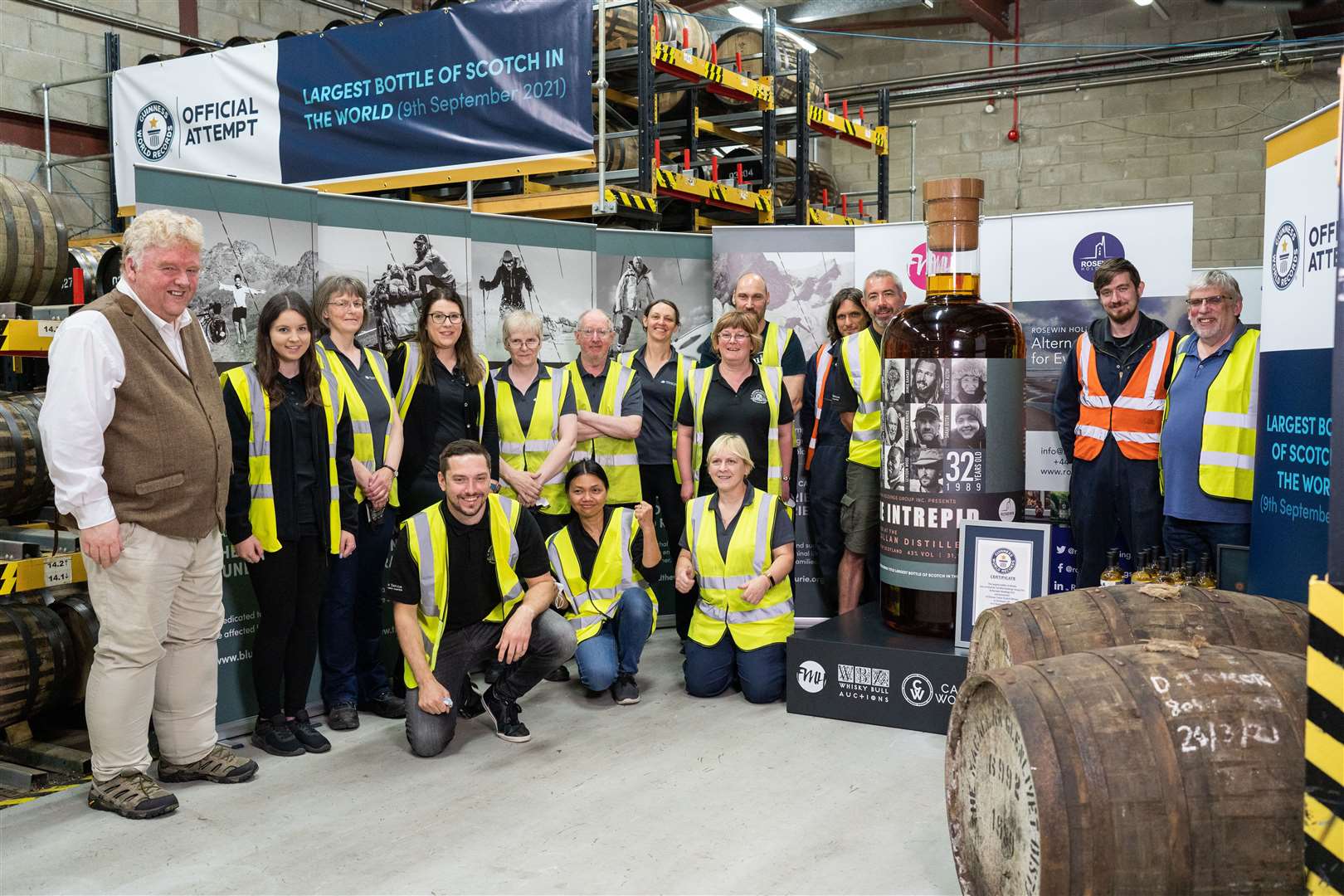 The Duncan Taylor team with the record breaking bottle of whisky.