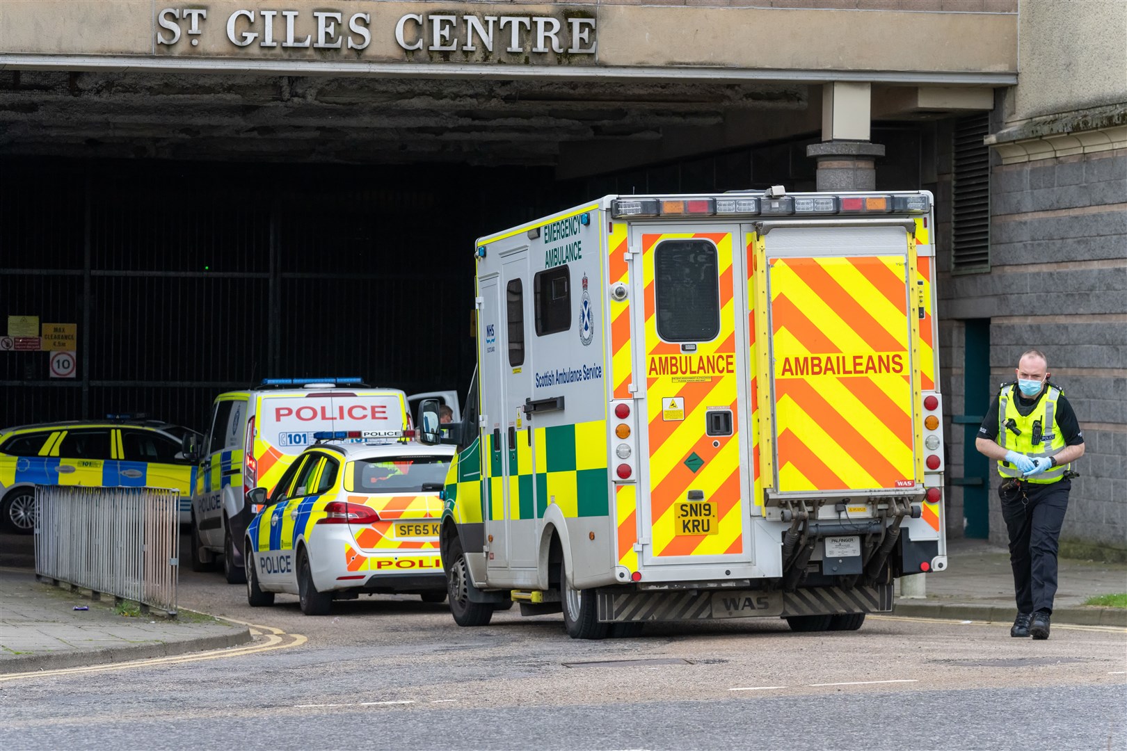 Police and ambulance attend an incident at the rear of the St Giles Centre in Elgin.