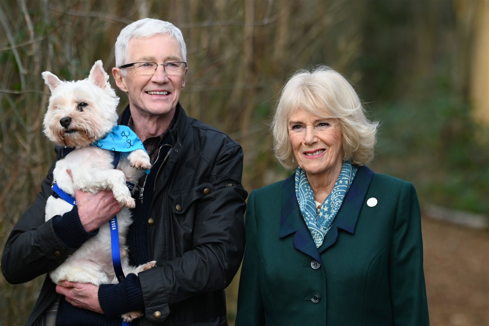 O’Grady was a doughty fighter for the rights of animals, particularly dogs. Here, the Battersea Ambassador takes a rescue dog for a walk alongside the then-Duchess of Cornwall (Stuart Wilson/PA)