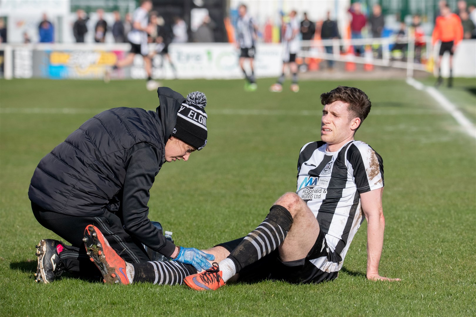 Lyall Booth injured. Elgin City FC (2) vs The Spartans (2) - SPFL League Two 23/24 - Borough Briggs, Elgin 06/04/24.Picture: Daniel Forsyth.