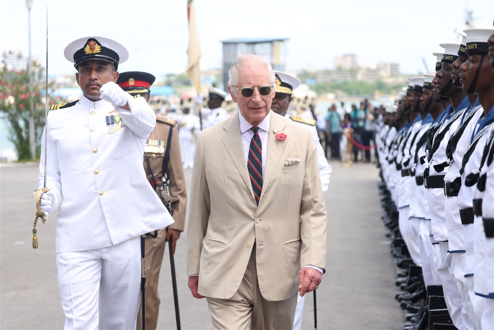 The King views the guard of honour during a ceremonial welcome at Mtongwe Naval Base (Ian Vogler/Daily Mirror/PA)