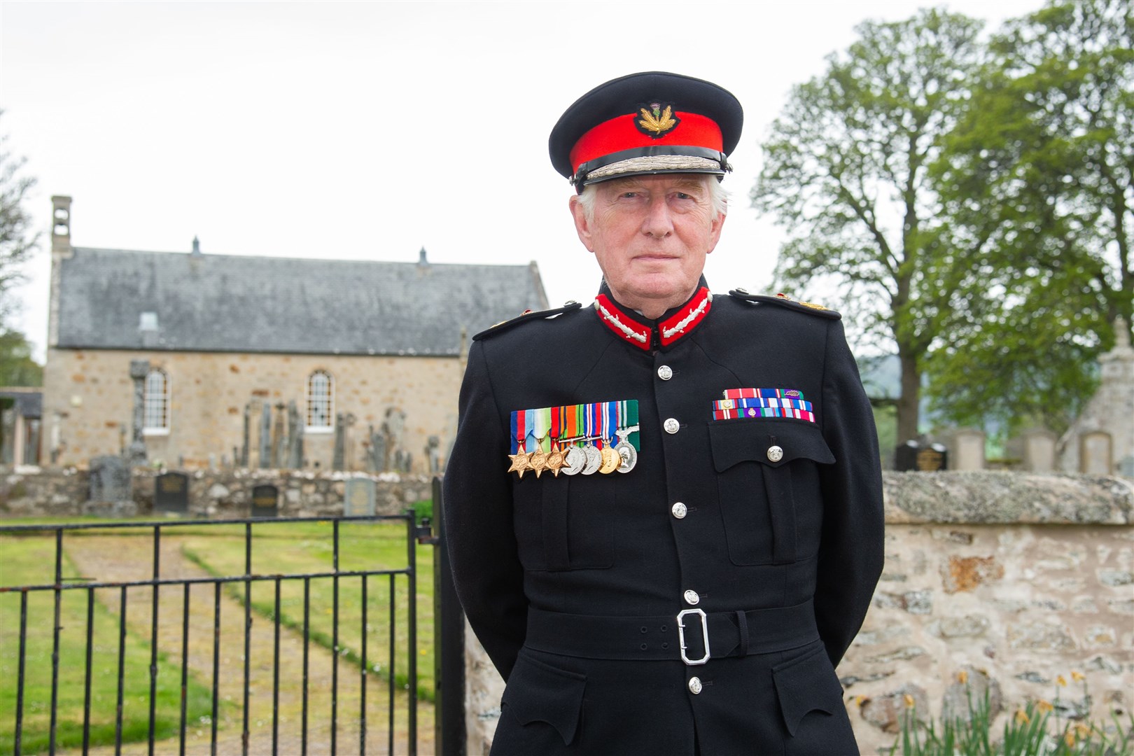 Lord Lieutenant of Moray - Major General The Honourable Seymour Monro CBE - recited Churchill's speech at the Dallas Churchyard to mark VE Day. He is proudly wearing his father Hector's war medals in honour of the Coastal Communities Pilot. ..75th anniversary celebrations of VE Day at the Forres War Memorial...Picture: Daniel Forsyth..
