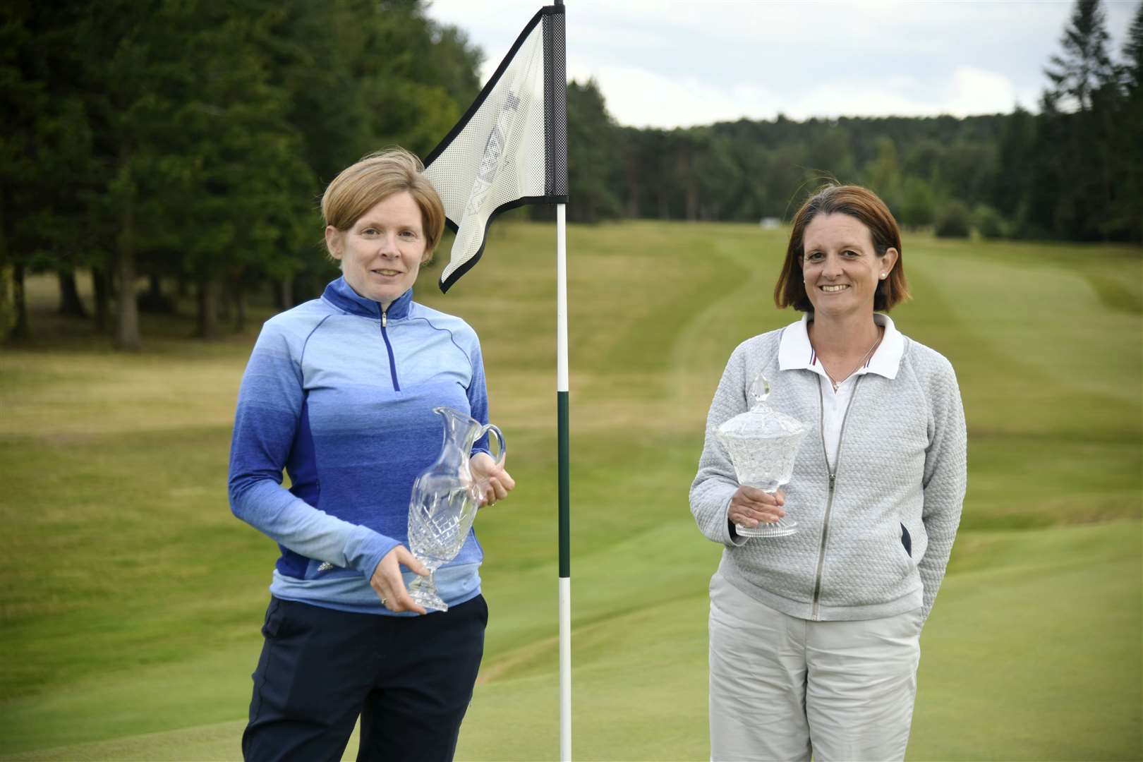 Winner of the Ladies Scratch Trophy, Shona Leese (left) and the winner of the Ladies Handicap Vase Fiona Black (right) on the 18th hole...Elgin Five Day Open 2022...Picture: Beth Taylor.