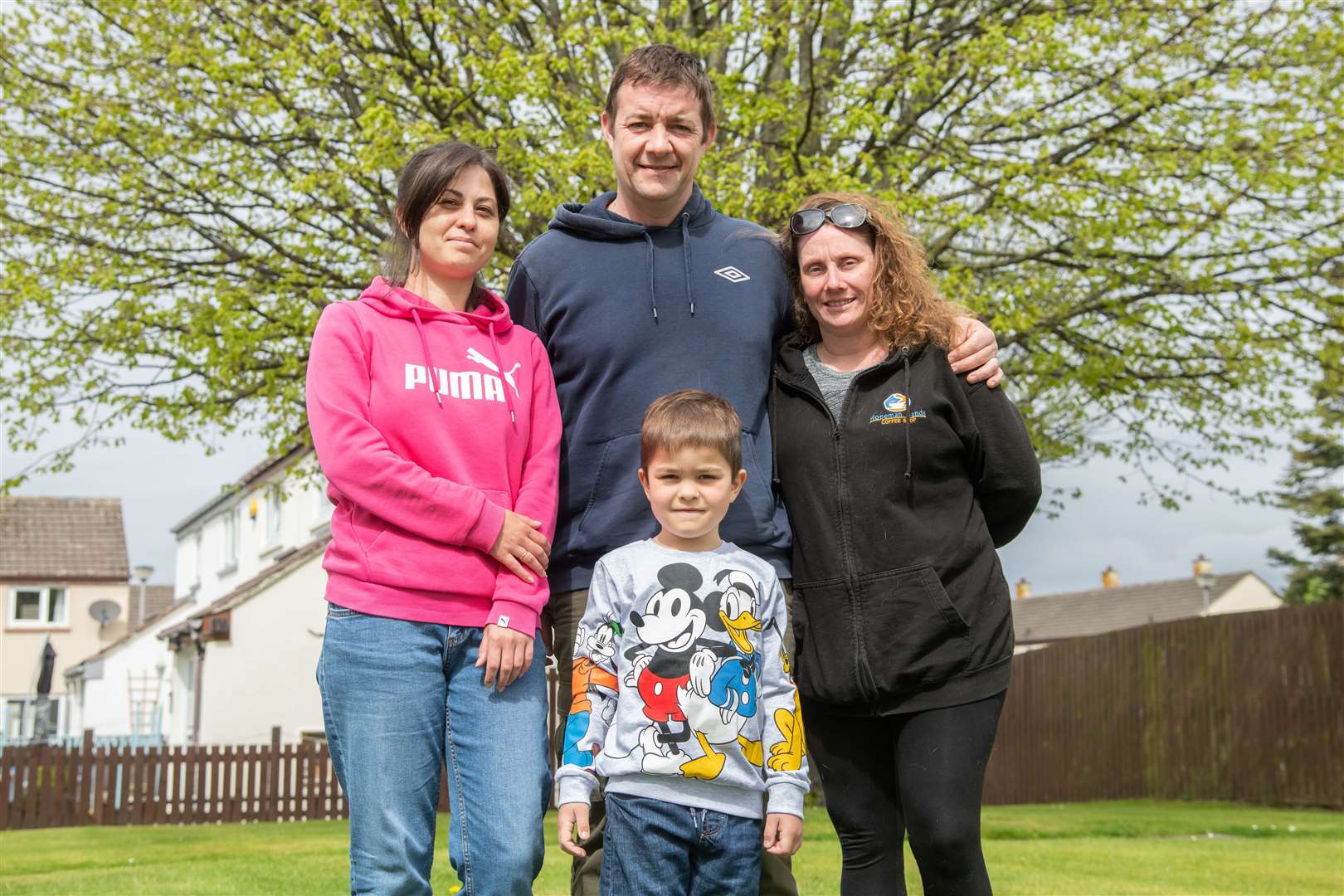 Ukrainians Ana (left) and son Alex with Barry and Kirsty Wilson in Kinloss. Picture: Daniel Forsyth