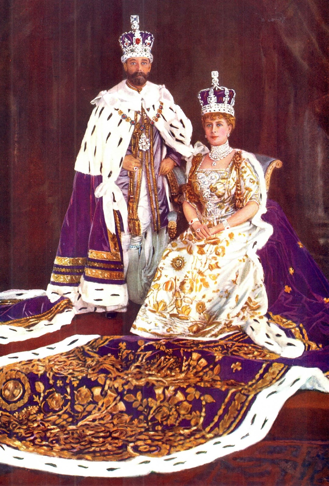 Queen Mary – with George V – in her coronation robes wearing the Queen Consort’s Ring in 1911 ( World History Archive/Alamy/PA)